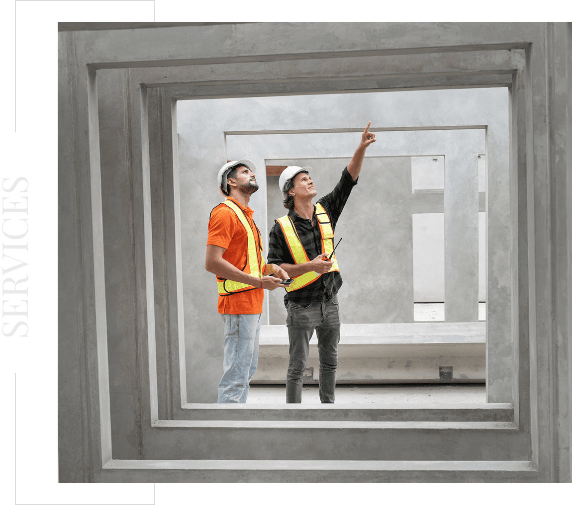 Workers in hard hats and vests